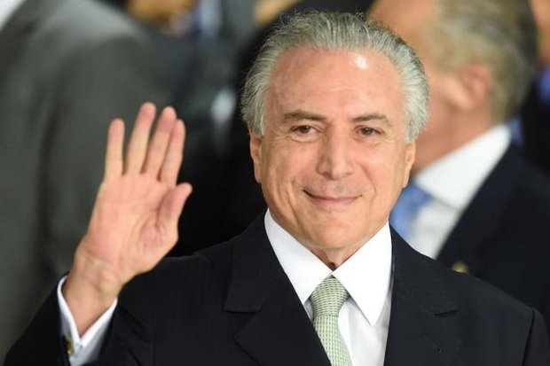 Temer disse também que, se for confirmado no cargo para cumprir o mandato até 31 de dezembro de 2018, pretende reduzir o desemprego (Foto: Foto: Evaristo Sa/AFP)