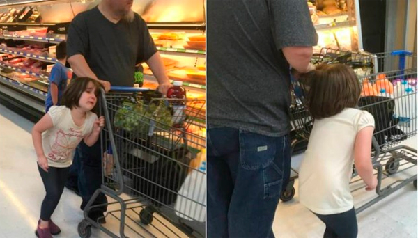 Criança chora ao ser puxada pelos cabelos (Foto: Reprodução/Facebook)