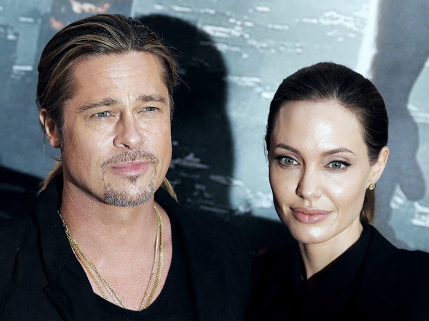 Brad Pitt e Angelina Jolie no tapete vermelho de 'Guerra Mundial Z' em Paris (Foto: AFP PHOTO/JACQUES DEMARTHON) Brad Pitt e Angelina Jolie no tapete vermelho de 'Guerra Mundial Z' em Paris (Foto: AFP PHOTO/JACQUES DEMARTHON)