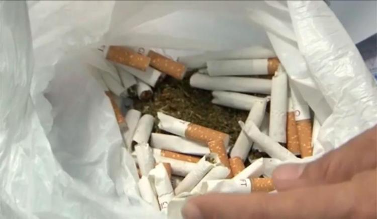 Maconha estava escondida dentro de cigarro levado para preso (Foto: Reprodução | TV Bahia)