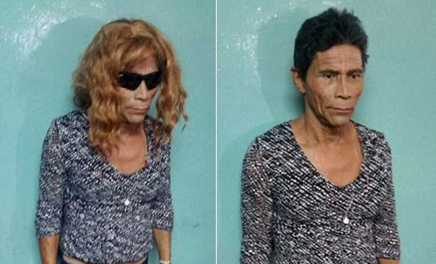Hondurenho Francisco Herrera Argueta, 55 anos, foi flagrado de peruca loira, óculos escuros, unhas pintadas e enchimentos nos peitos Hondurenho Francisco Herrera Argueta, 55 anos, foi flagrado de peruca loira, óculos escuros, unhas pintadas e enchimentos nos peitos