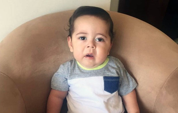 Breno, de 1 ano e meio, tinha problemas neurológicos e estava com dor no estômago (Foto: Reprodução/Facebook)