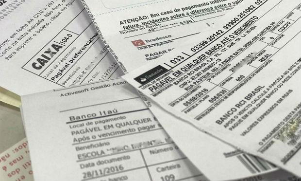 A Febraban começará a adotar, de forma escalonada, uma plataforma de cobrança que permite a quitação de boletos em atraso em qualquer agência bancária (Foto: Reprodução)
