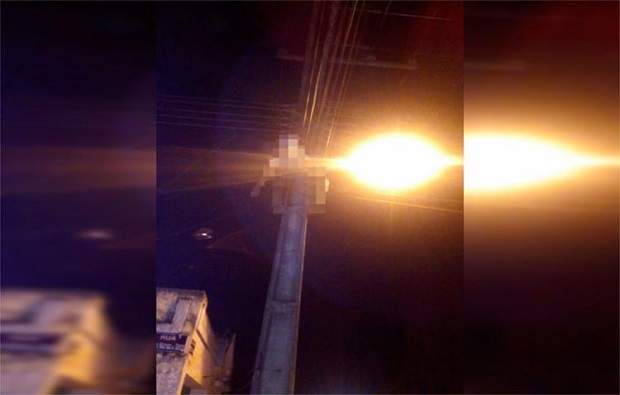 Vítima foi terirada dosfios de alta tensão pelos bombeiros (Foto: Reprodução)