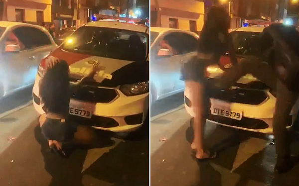 Vídeo mostra momento em que policial militar agrede com chute uma jovem que dançava em frente a uma viatura (Foto: Reprodução)