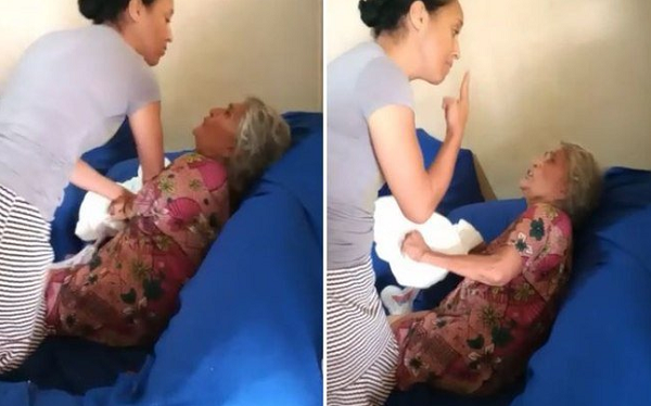 Lucimara Pires, de 34 anos, agredindo sua sogra, de 73 anos (Foto: Reprodução)