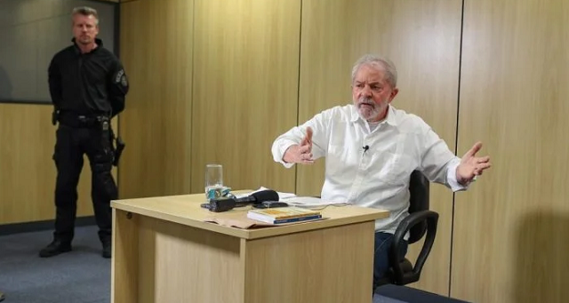 Lula e Jorge Chastalo, ao fundo (Foto: Ricardo Stuckert