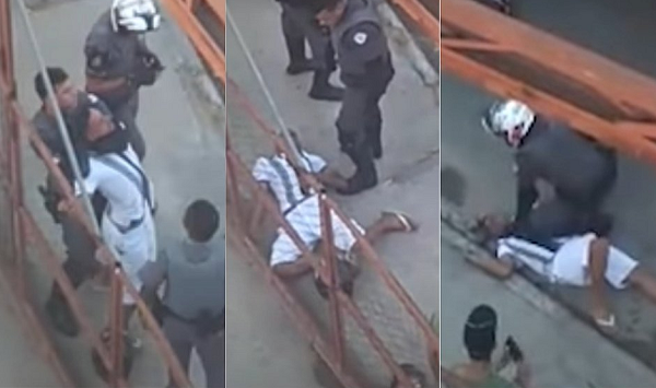 Policial militar (PM) aplica um mata-leão (golpe de estrangulamento) em um dos homens (Foto: Reprodução)