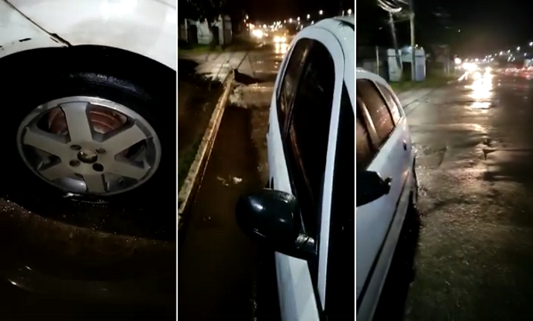 Motorista perdeu três pneus, em dois dias seguidos, após cair em buracos, na Avenida Jorge Amado, nas imediações do Hospital Geral de Camaçari (HGC) (Foto: Reprodução)