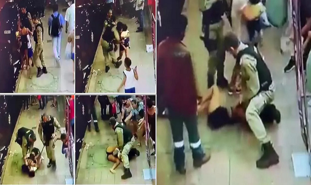 Policiais militares prenderam uma mulher com um bebê de colo a imobilizando com um golpe de joelho no pescoço (Foto: Reprodução)