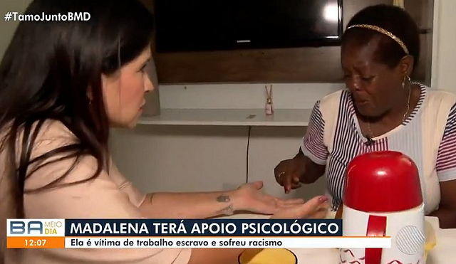 Madalena chamou a atenção pela forma como reagiu após tocar na mão da repórter da TV Bahia, Adriana Oliveira (Foto: Reprodução/TV Bahia)