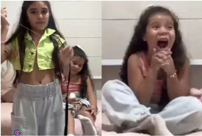 A pequena Ana Beatriz decidiu ajudar sua irmã a arrancar o dente e bolou uma 'operação' inusitada, contando com a ajuda do cachorro