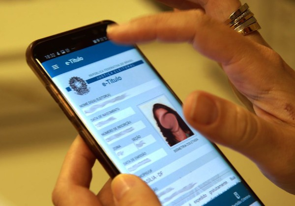 Site da justiça eleitoral e e-Título indicam zona eleitoral e seção (Foto: Marcello Casal Jr/Agência Brasil)