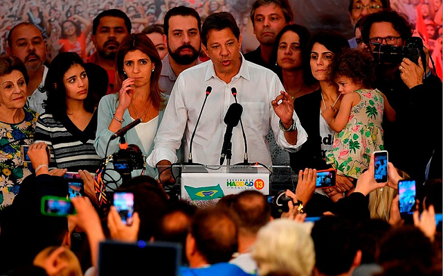 Haddad (PT) em coletiva (Foto: AFP) Haddad (PT) em coletiva (Foto: AFP)