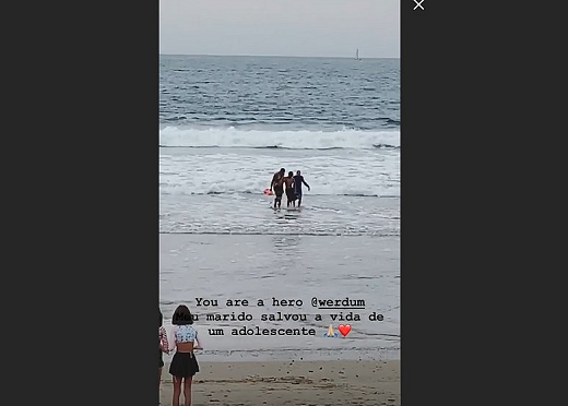 O brasileiro, ex-campeão dos pesos-pesados do UFC, fazia um pique-nique com a família quando viu dois jovens em apuros no mar, um menino e uma menina (Foto: Reprodução) O brasileiro, ex-campeão dos pesos-pesados do UFC, fazia um pique-nique com a família quando viu dois jovens em apuros no mar, um menino e uma menina (Foto: Reprodução)